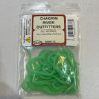A package of Wapsi Sili Worms, silicone green in color, displayed on a table with the brand label 'Chagrin River Outfitters'.