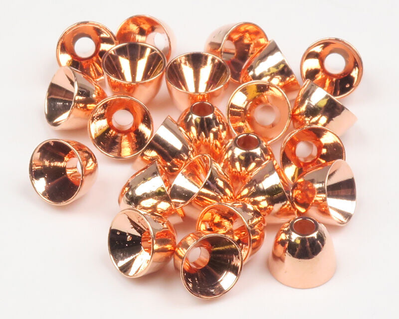 Copper Hareline Brass Cone Heads on a white surface