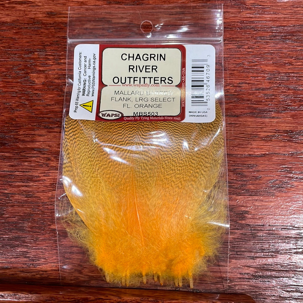 Packaged Wapsi Mallard Barred Flank in orange, select size for fly tying, visible through a clear plastic bag with a red and white label.