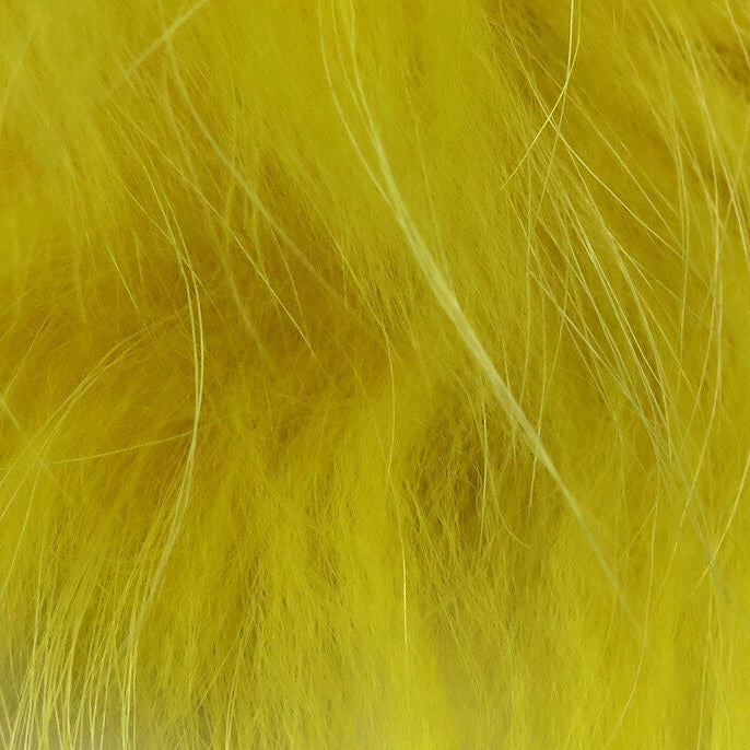 Close-up of bright yellow Hareline Finn Raccoon Zonker
