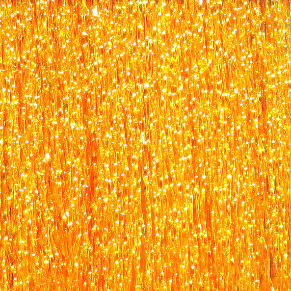 Close-up of orange Hareline Krystal Flash
