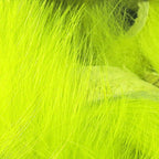 Close-up of bright green Hareline 1/4" Magnum Rabbit Strips