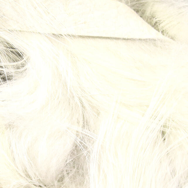 Close-up of a ball of cream Hareline 1/4" Magnum Rabbit Strips