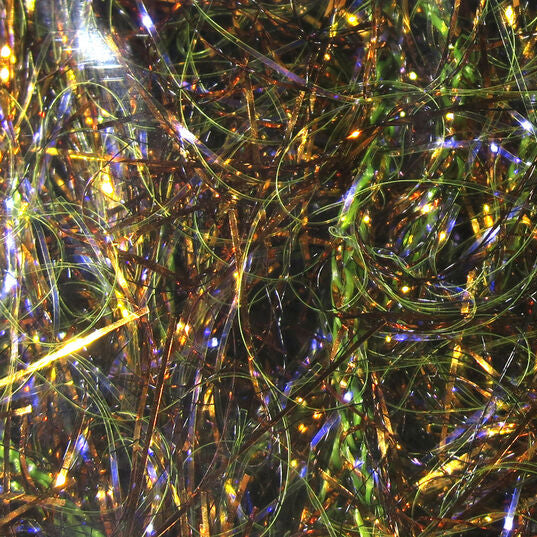 Close-up of Hareline Large Sized UV Polar Chenille with gold, green, and purple hues.