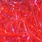 Close-up of red and pink Hareline Large Sized UV Polar Chenille