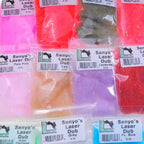 Multiple packages of Senyo's Laser Dub fly tying material in various colors, arranged for visibility.