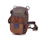 A brown vertical chest pack designed for fishing, with a green and brown color scheme, featuring a main compartment zipper, an interior zippered pocket, and attachment loops.