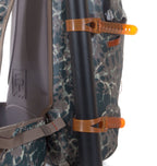 A pair of orange Fispond lariat gear straps with buckle closures around a rod tube.