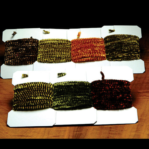 Set of Hareline Variegated Medium Chenille samples on a wooden surface