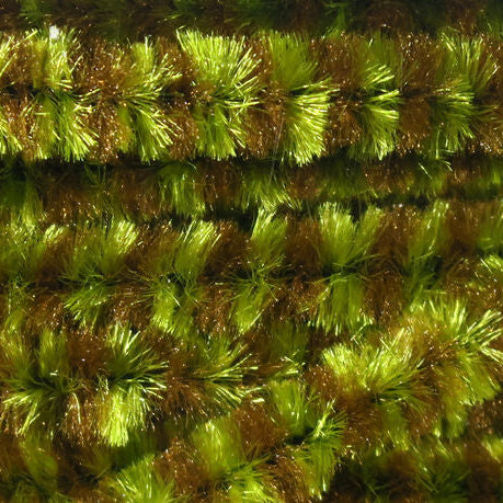 Close-up of green and gold Hareline Variegated Medium Chenille