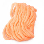 A skein of orange Wapsi Egg Yarn designed for fly-tying, approximately 15 feet in length.