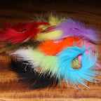 Colorful Hareline Finn Raccoon Zonkers on a wooden surface